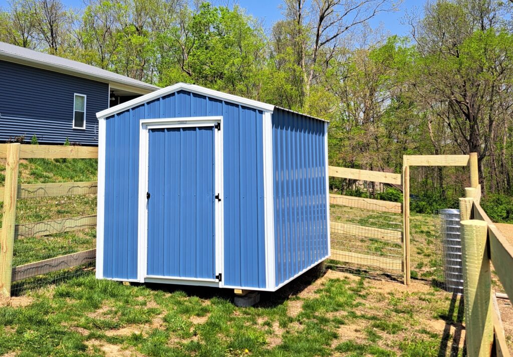 8x10 bargain barn with blue metal siding and white trim, budget-friendly sheds