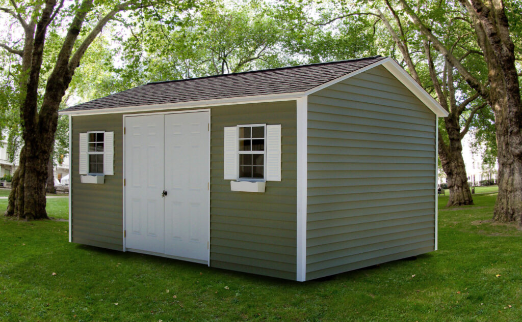 a frame garden shed with green siding and white doors and windows, best sheds for gardening