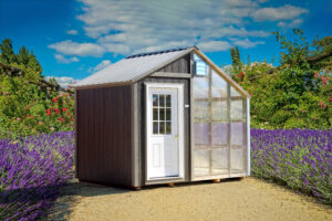 pre-built greenhouse with brown siding