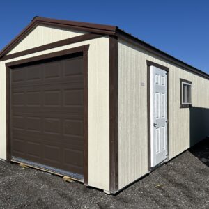 one car garage with cream siding and brown garage door