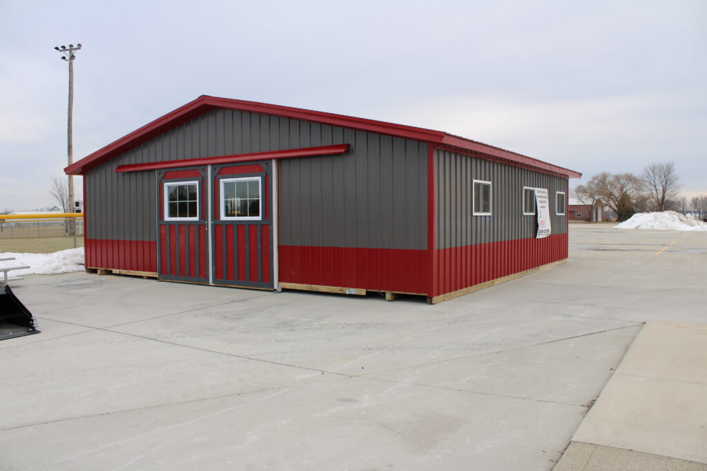 heritage horse barn with gray and red metal siding