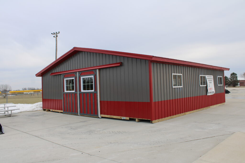 heritage horse barn with gray and red metal siding