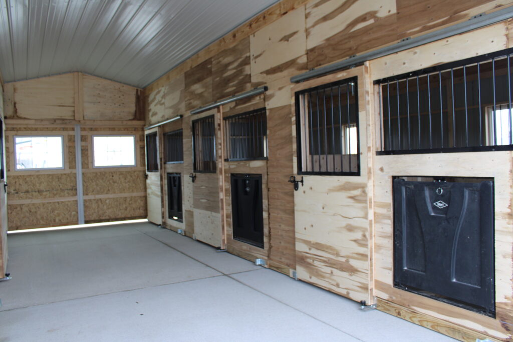 aisle of stalls in heritage horse barn