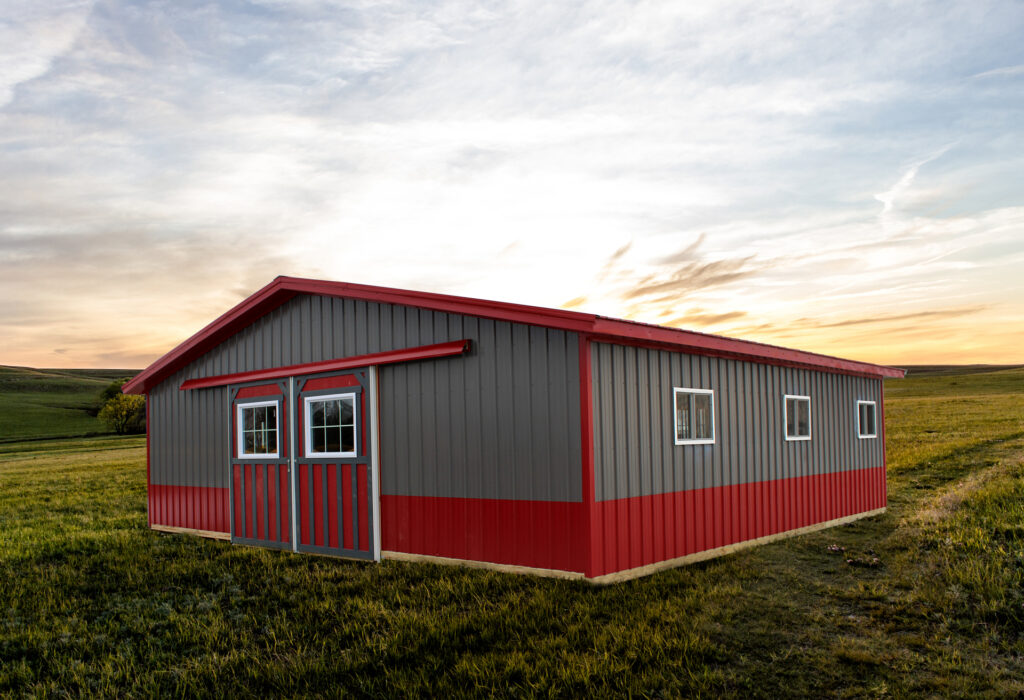 heritage horse barn with gray and red siding 