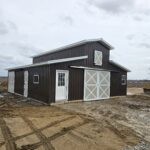 monitor horse barn with burnished slate metal siding