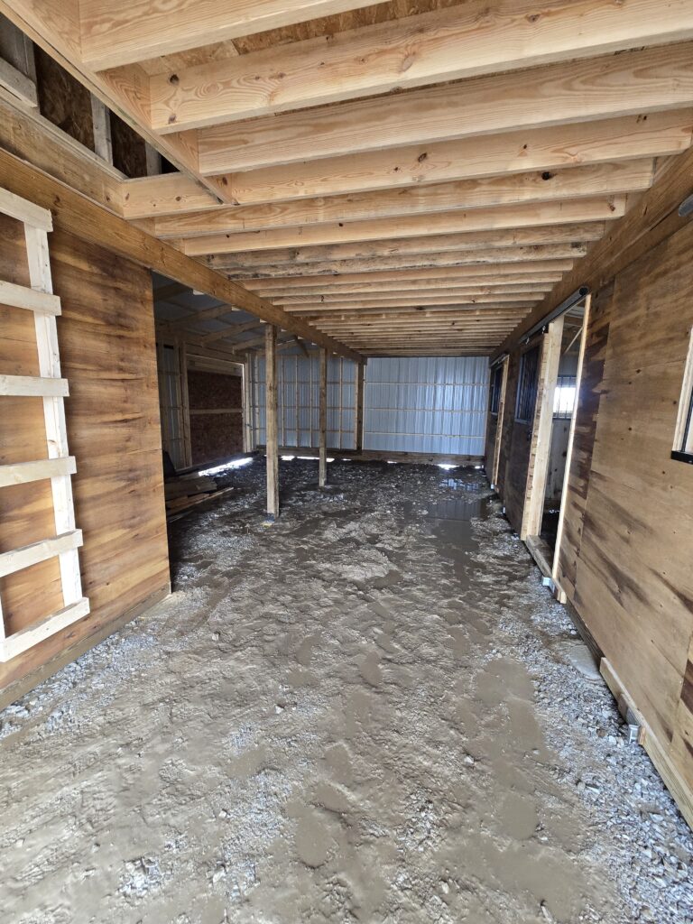 breezeway in monitor horse barn