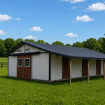 heritage horse barn with white siding and brown doors
