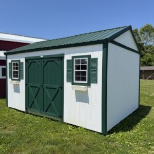 12x16 garden shed with white siding and green doors and trim