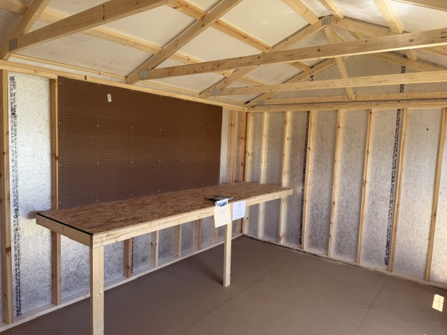 workbench and pegboard in a 12x16 garden shed