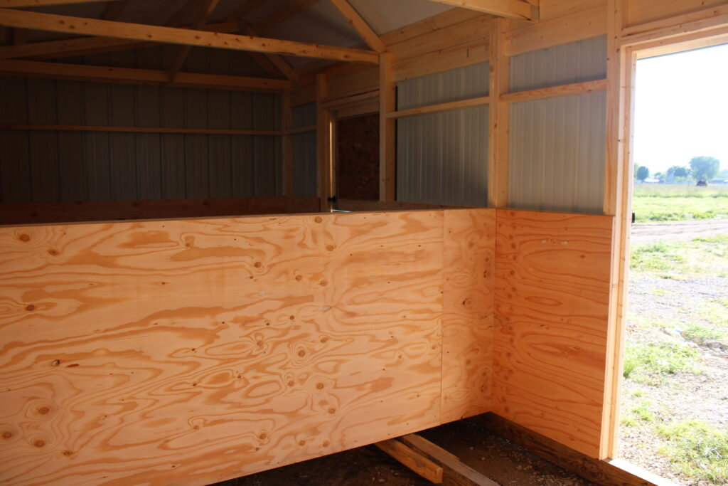 deluxe horse barn interior - hardwood kickboards