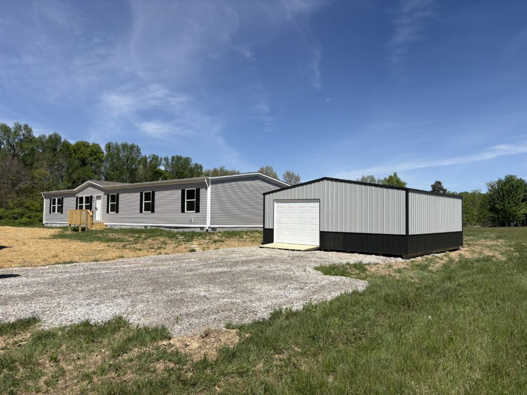 2-car garage with grey and black siding