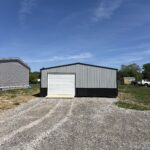 2-car garage with one white garage door
