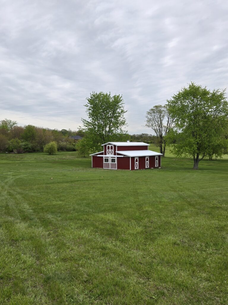 monitor horse barn in a field