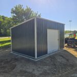 utility shed with green siding