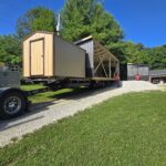 delivery truck unloaded half of two car garage