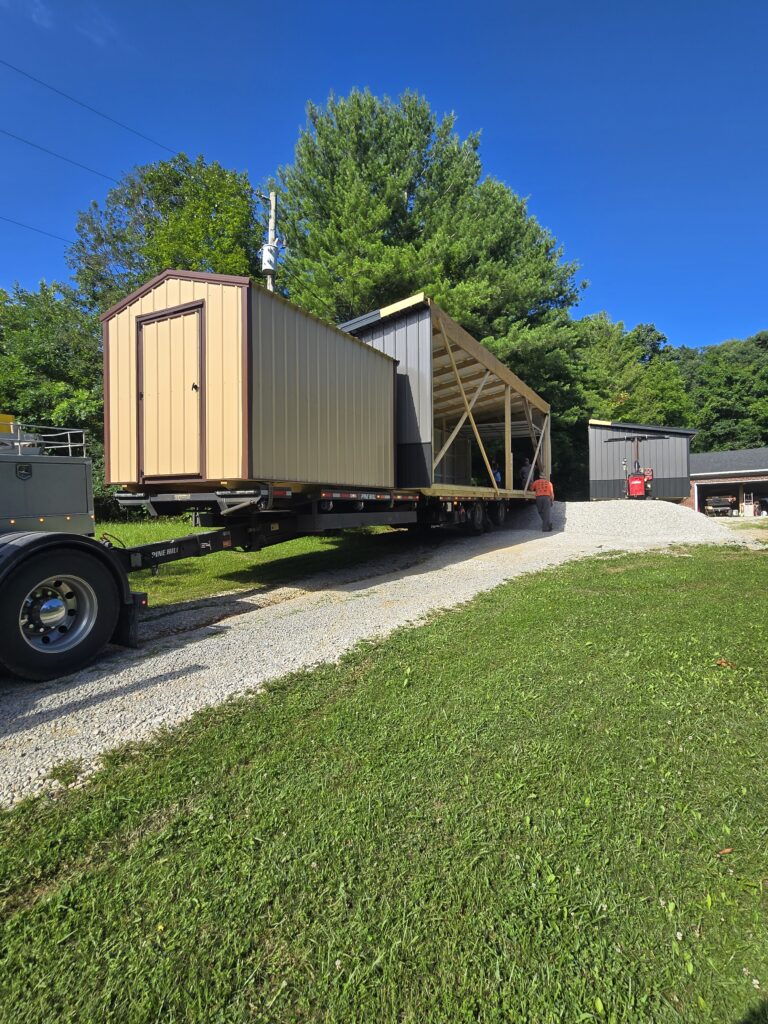 delivery truck unloaded half of two car garage
