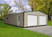 two car garage with tan siding