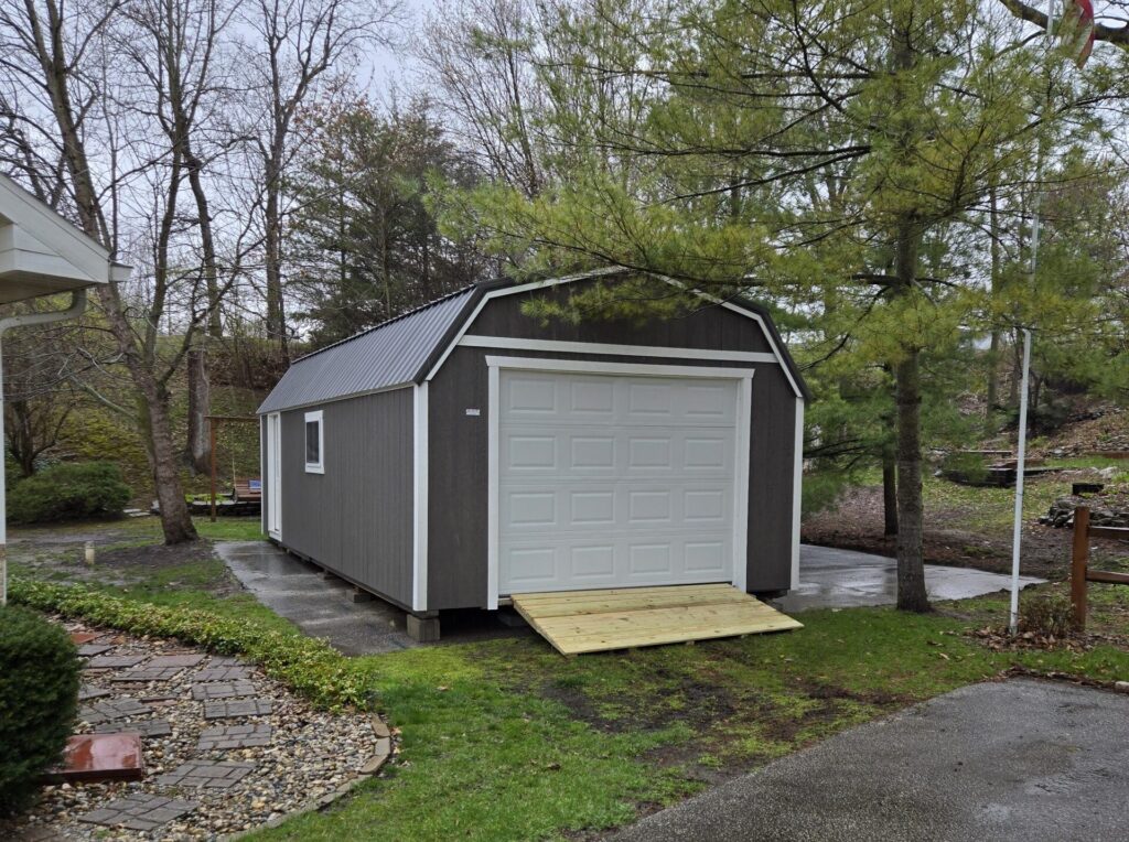 lofted garage with concrete foundation